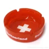 Cendrier rouge avec croix suisse en verre