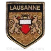 Insignia dorada de Lausana para coser