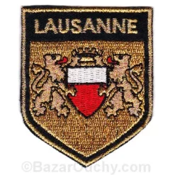 Golden Lausanne sew-on badge