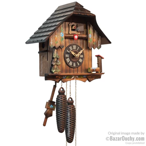 Horloge chalet coucou avec croix suisse à Lausanne