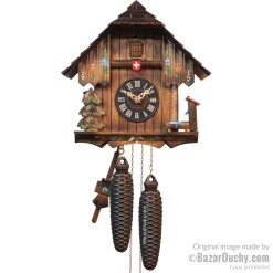 Horloge chalet coucou avec croix suisse à Lausanne