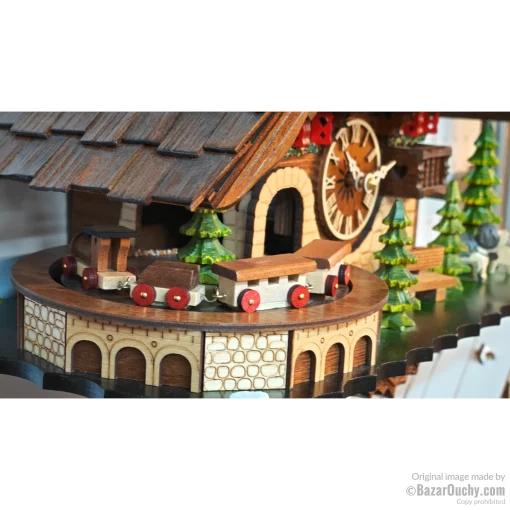 Coucou suisse chalet horloge avec train et danseurs