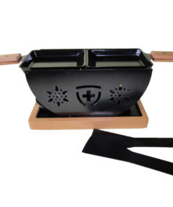 Four à raclette avec bougie