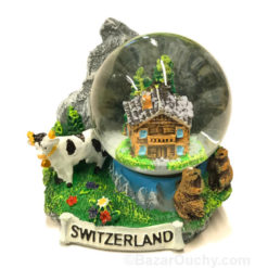 Palla di neve - Chalet, montagna e mucca svizzera
