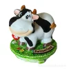 Figura de vaca decoración suiza